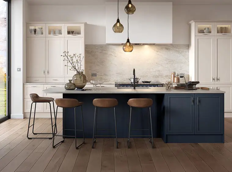Inframe wood grained kitchen in cream and slate blue with light grey quartz worktops and solid oak floor. Kitchens & Interiors, Frome, Somerset.