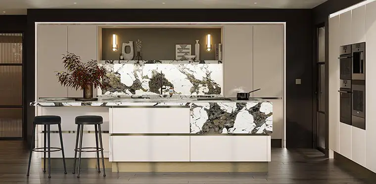 Grey handleless kitchen with statement marble style worktop.